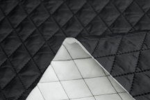 Курточная стёганая ткань чёрного цвета.