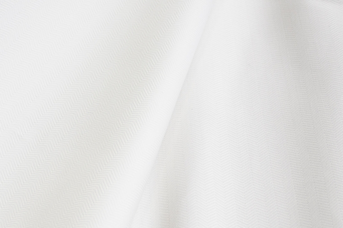 Жаккардовый костюмный хлопок в ёлочку нежно молочного  оттенка